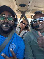Aero Global Aviation Academy instructor with 2 persons